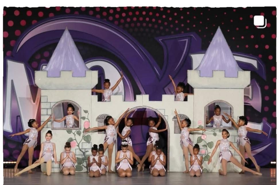 Tiny & Mini K Company dancers performing a castle-themed routine on stage
